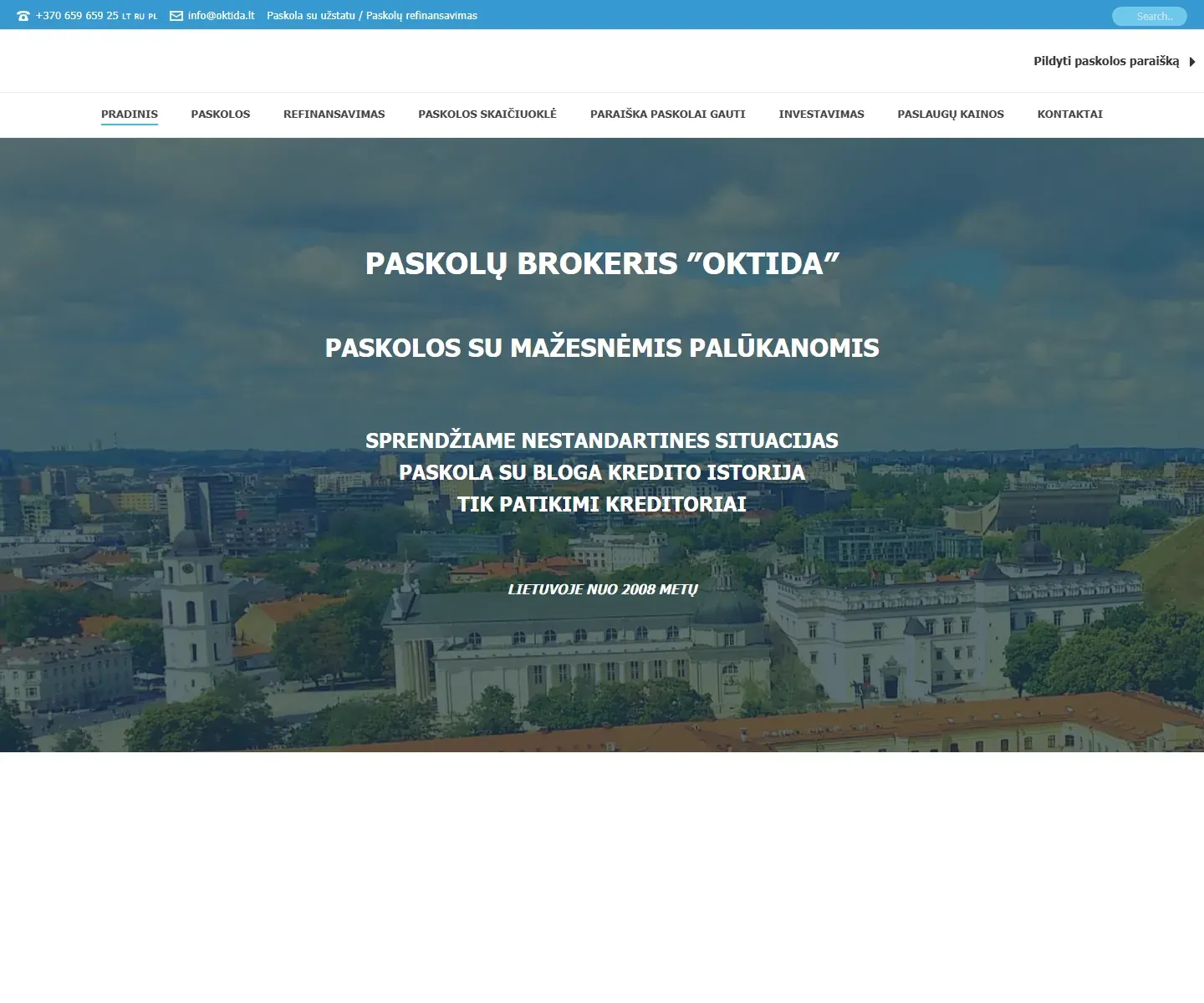 Sena paskolasuuzstatu.lt svetainė 2021 m.: Vilniaus panorama ir baltas tekstas „Paskolų brokeris OKTIDA“